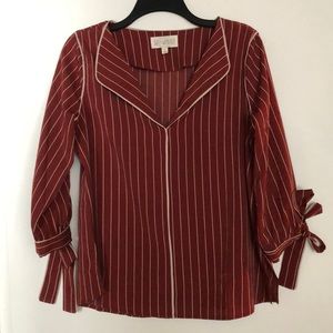 Blouse with tie sleeves